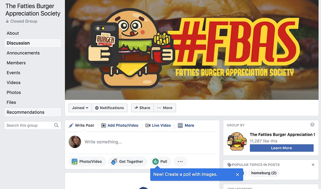 fatties burger appreciation society facebook group burger holding phone and fries